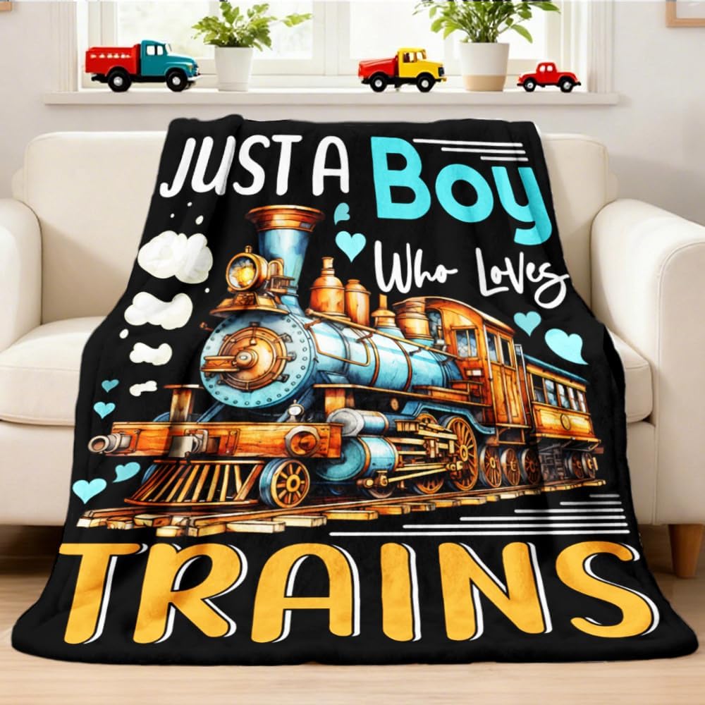 Xvx-Boom train blanket for kids featuring a black flannel fleece fabric with a vintage steam locomotive engine front view graphic.