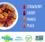 Close up of colorful strawberry cherry mango and peach organic gummy bear candies.