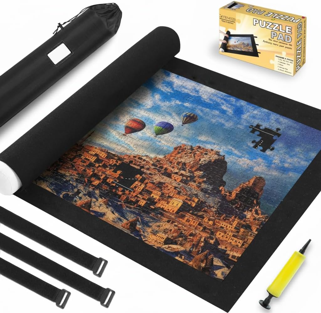 Genovega Jigsaw Puzzle Mat Roll Up Kit showing the premium black felt surface with colorful puzzle pieces.