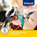 Serving suggestion for Vitakraft bird egg food in a bowl