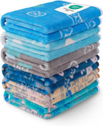 Luciphia lightweight pet blanket being packed into a travel bag for an outdoor picnic.