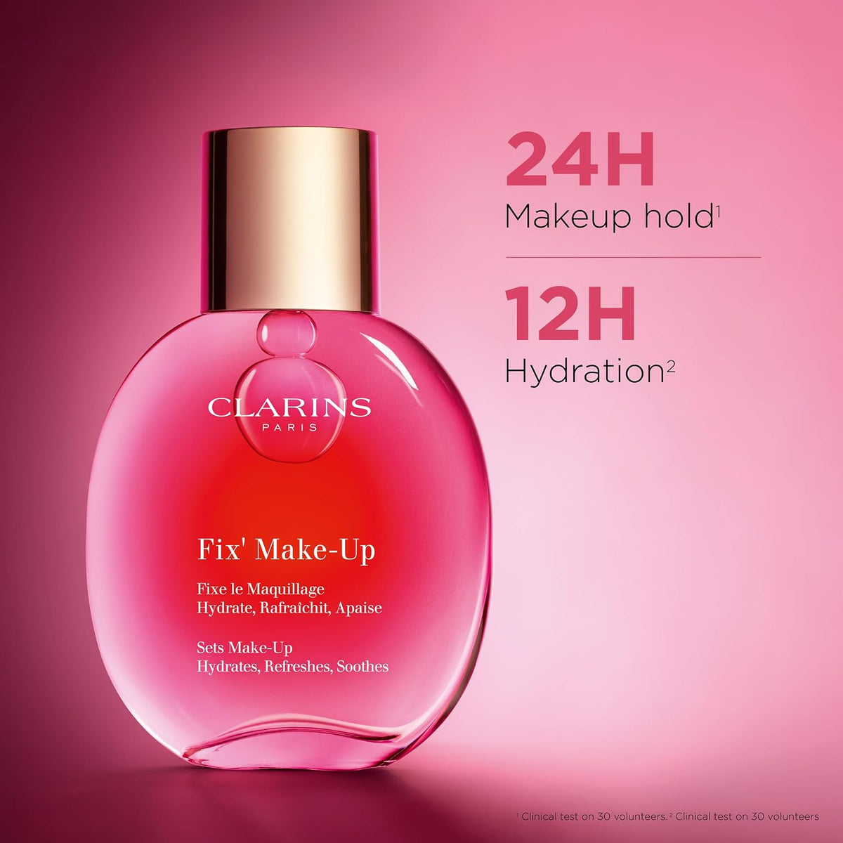 Clarins Fix Make-Up Setting Spray showing golden cap and pink container