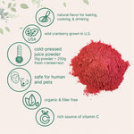 Cold pressed organic cranberry powder mixed in a glass of water