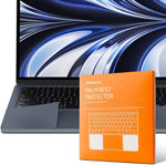 UPPERCASE GhostShield Premium Palm Rest Protector front view on a midnight MacBook Air showing complete trackpad surrounding coverage.