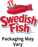 Close up shot of red white and blue mini fish shaped gummy candies