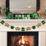 KnomeKo St Patricks Day Banner Decorations front view hanging on a living room fireplace mantle.