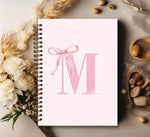Preppy pink aesthetic spiral notebook side angle