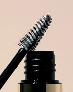 Feathered and fluffed eyebrow look using Milani clear wax gel
