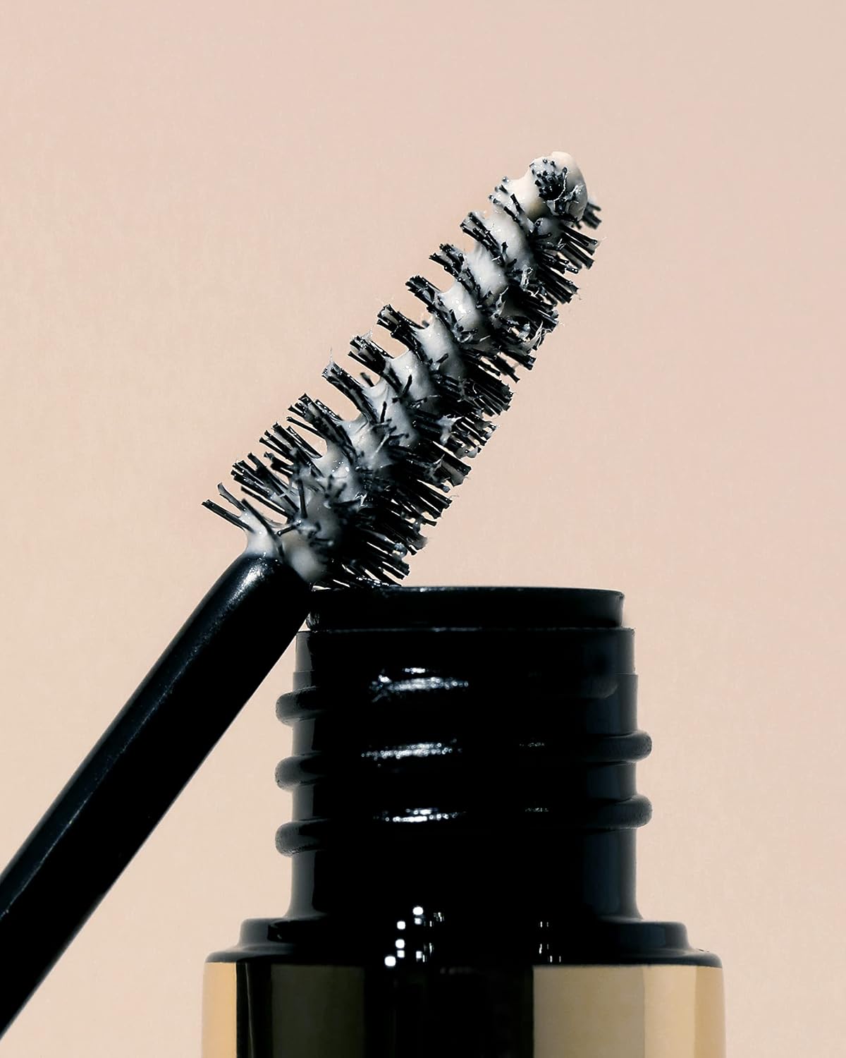 Feathered and fluffed eyebrow look using Milani clear wax gel