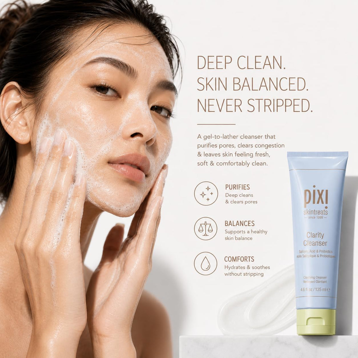 Pixi pore minimizing daily facial cleanser bottle standing next to fresh botanical ingredients