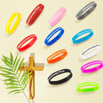 Close-up of debossed inspirational faith text on bands