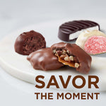 Russell Stover thirty two point one ounce gourmet chocolate box open presentation