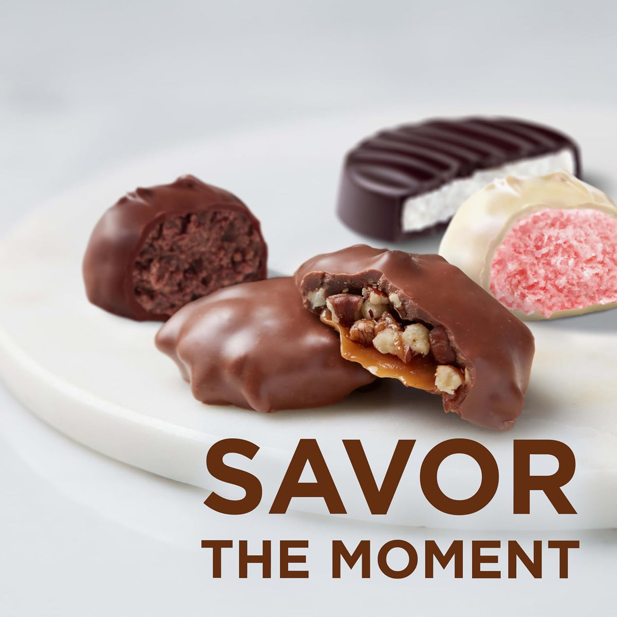 Russell Stover thirty two point one ounce gourmet chocolate box open presentation
