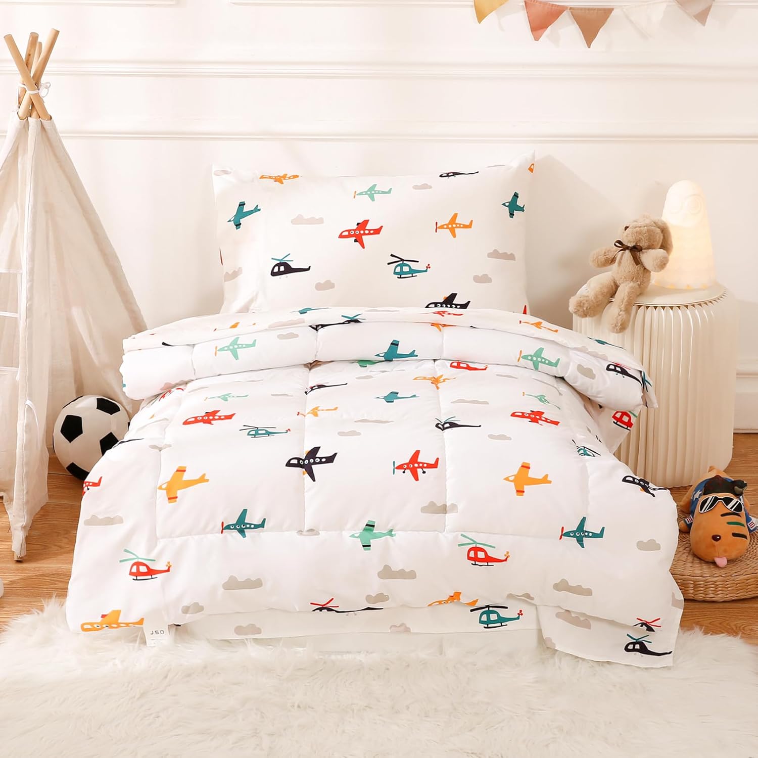 JSD Airplane Toddler Bedding Set front view featuring white cartoon planes comforter spread on a toddler bed
