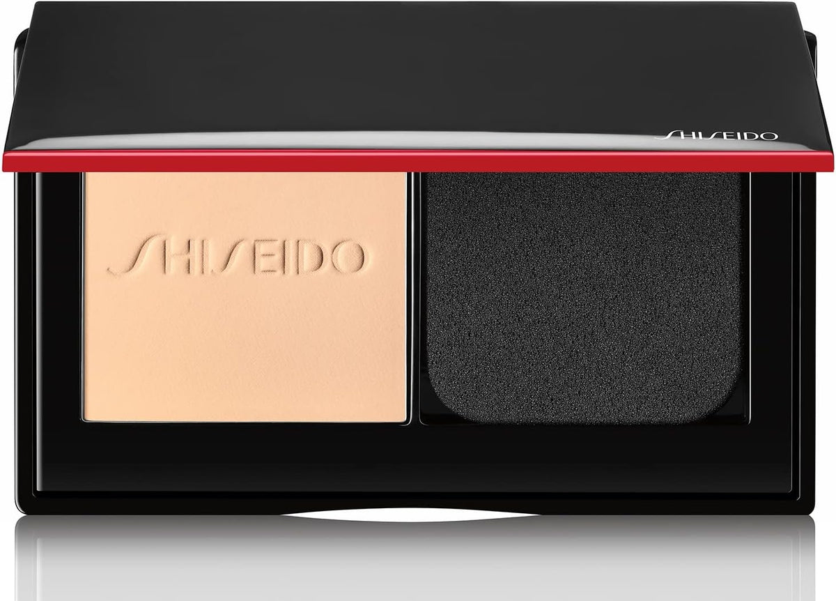 Shiseido Synchro Skin Self Refreshing Powder Foundation front view showing the sleek black and red compact case open with mirror.