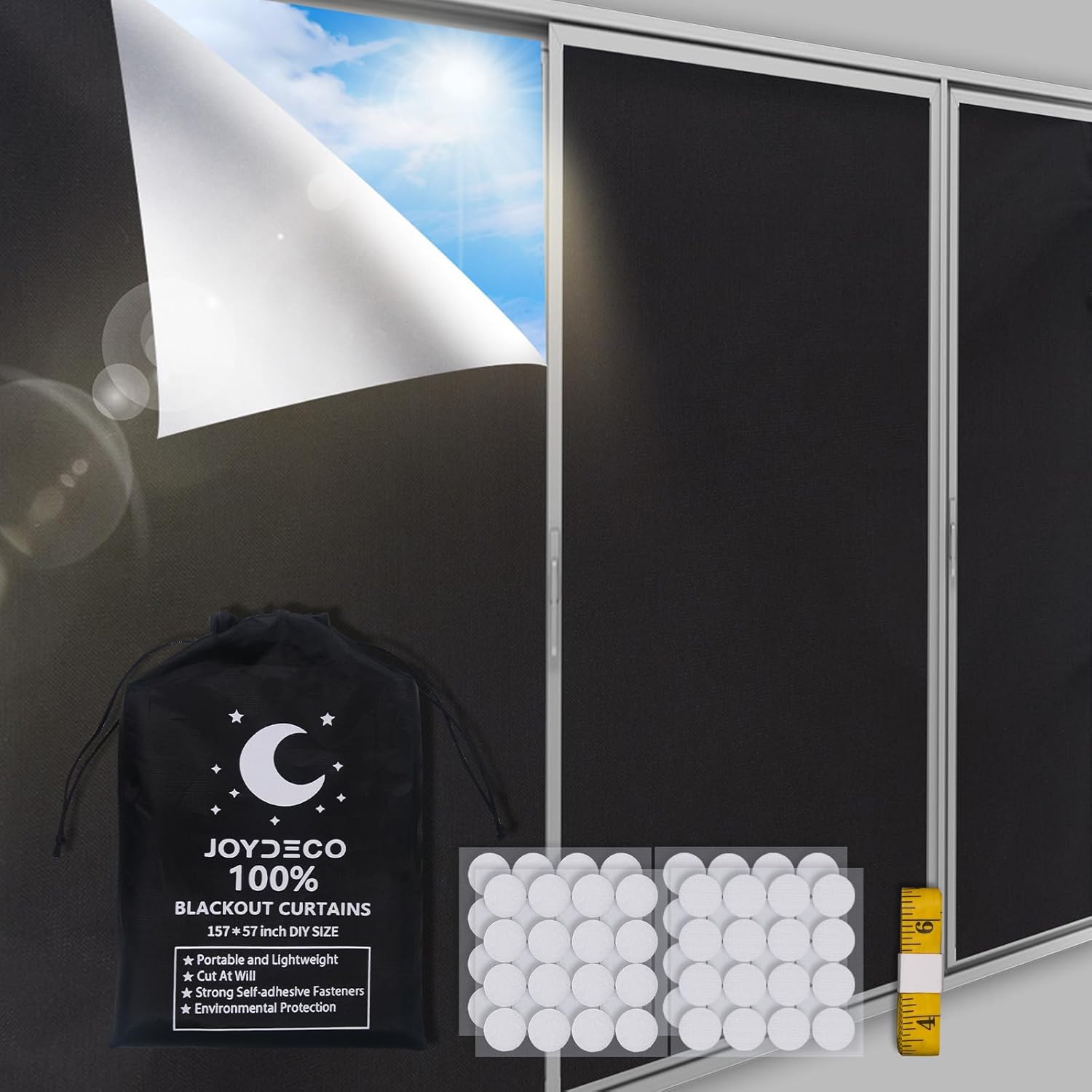 Joydeco Portable Blackout Shades front view showing complete light blocking fabric over a bedroom window.