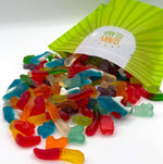 Close up shot of fruit flavored American gummy worms and butterflies from Sunny Island