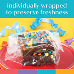 Close up of fudgy brownie with colorful candy gems