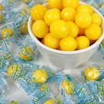 Individual yellow Lemonhead candy wrappers
