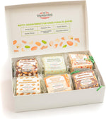 Gourmet chocolate walnut and butter pecan fudge varieties close up view