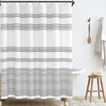 Jinchan black and white striped shower curtain front view installed in a modern farmhouse style bathroom.