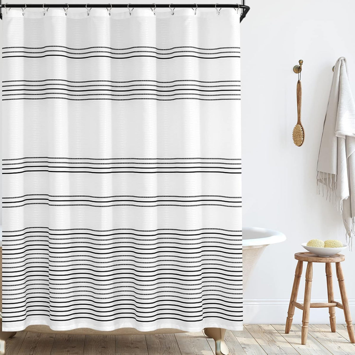 Jinchan black and white striped shower curtain front view installed in a modern farmhouse style bathroom.