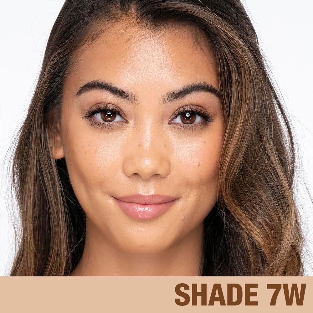 Authentic USA imported Charlotte Tilbury liquid foundation tube on a vanity counter