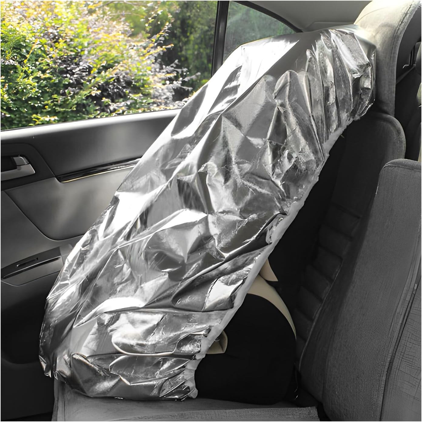 Ziciner Baby Car Seat Sun Shade Cover front view reflecting bright sunlight on an infant seat.