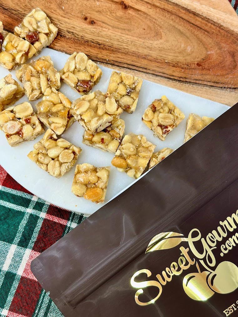 SweetGourmet premium peanut brittle candy squares showing the rich buttery texture and roasted peanuts.