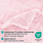 Washable cat blanket folded neatly displaying the pink blush color