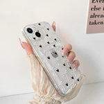 Black ribbon bow design case in hand