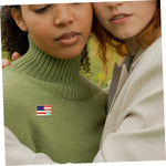 GALPADA waving flag brooch styled on jacket fabric