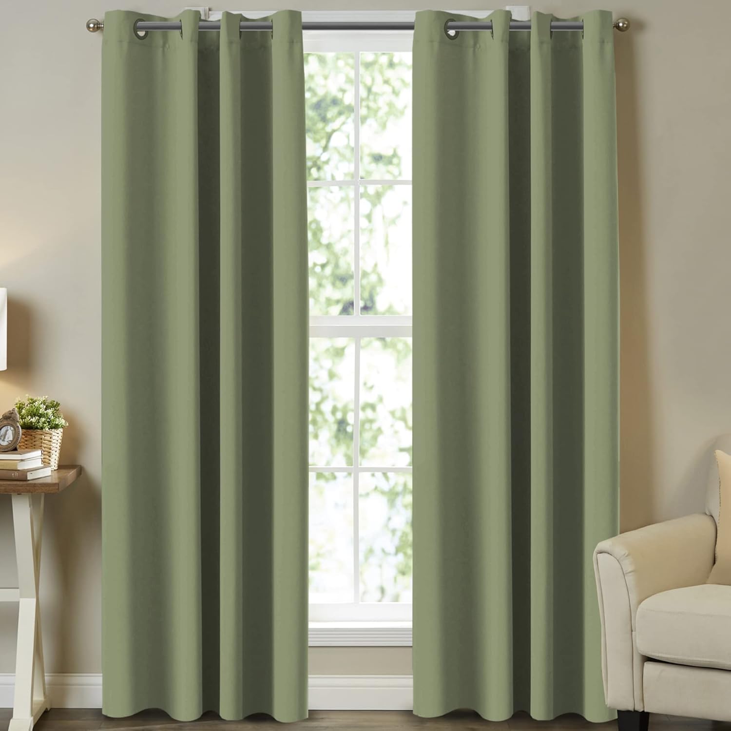 Turquoize Bedroom Blackout Curtains front view of sage green panels hung on a window rod