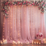 Wish Care dusty rose tulle backdrop curtain front view showcasing elegant drapes with integrated warm white string lights