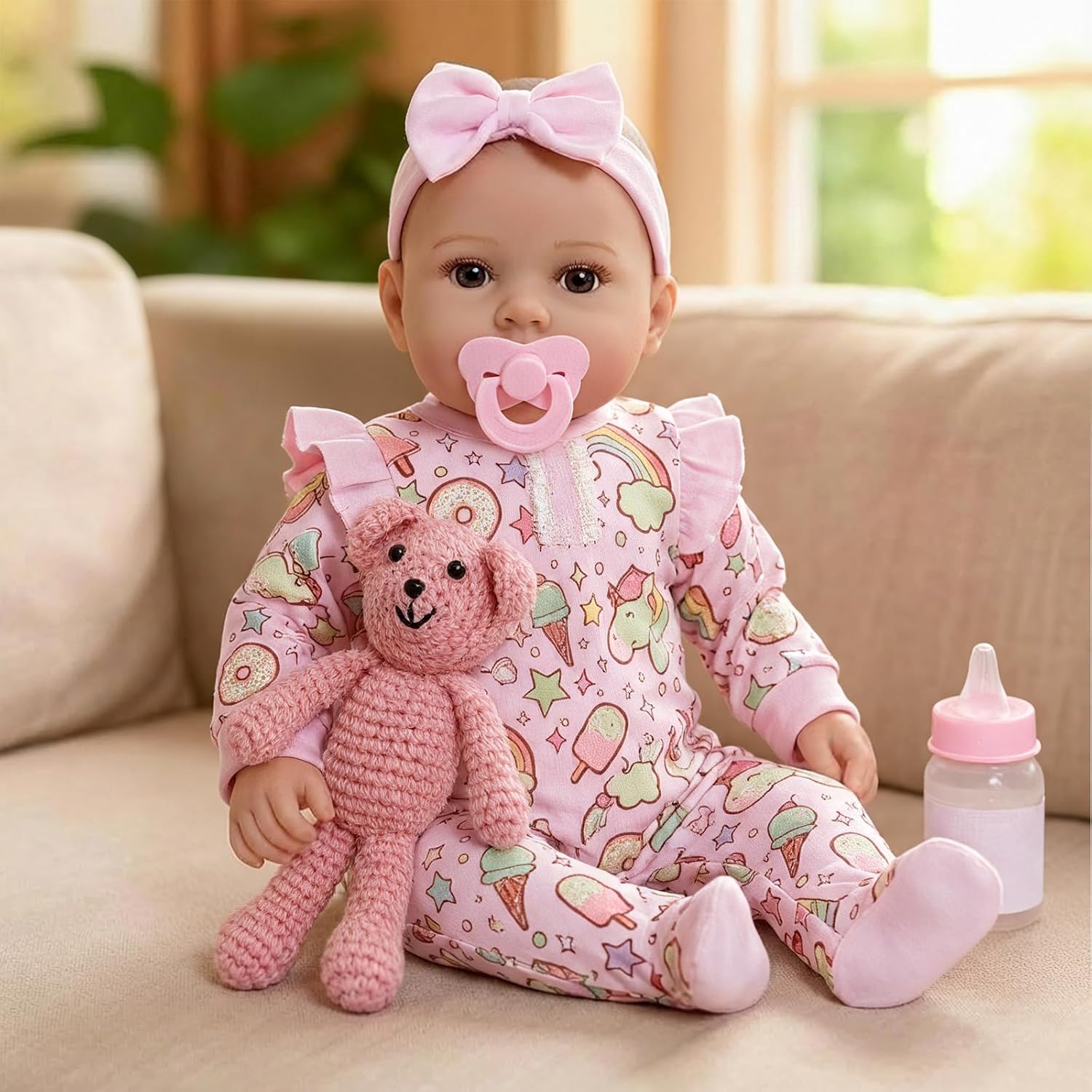 GOAROY realistic newborn baby doll girl front view dressed in pink romper