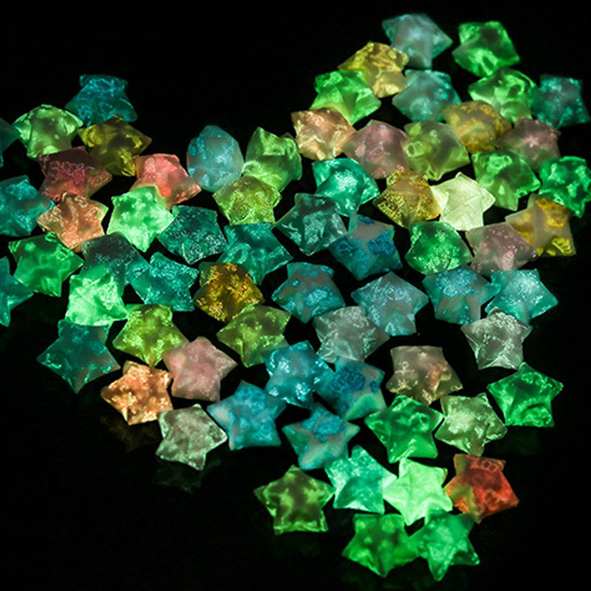Completed luminous paper stars glowing in the dark