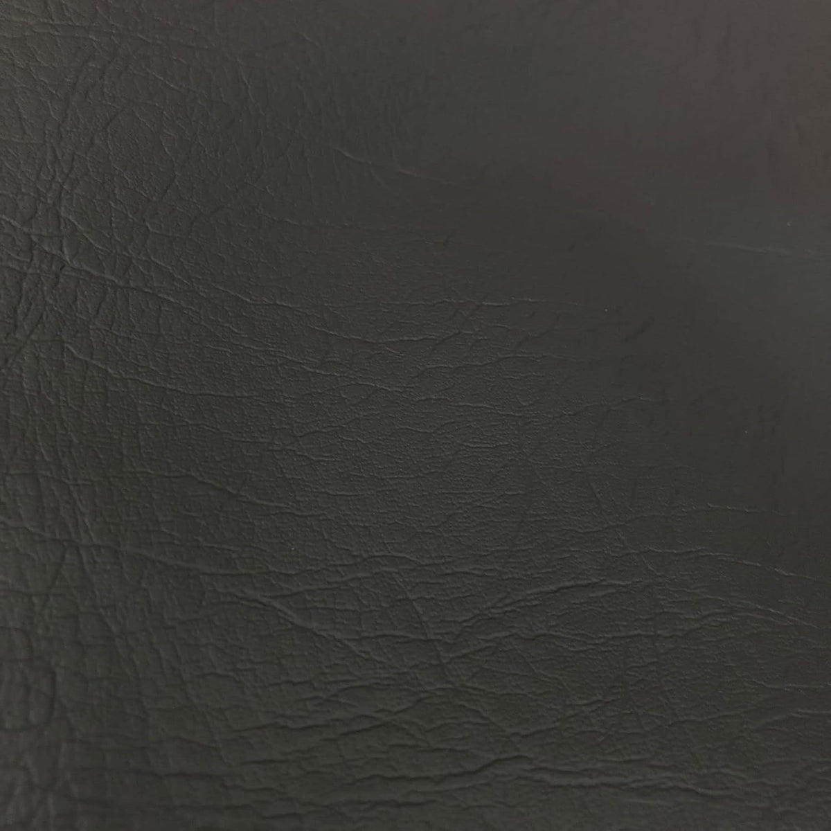 SARANDAVE faux leather fabric front view. Charcoal grey material.