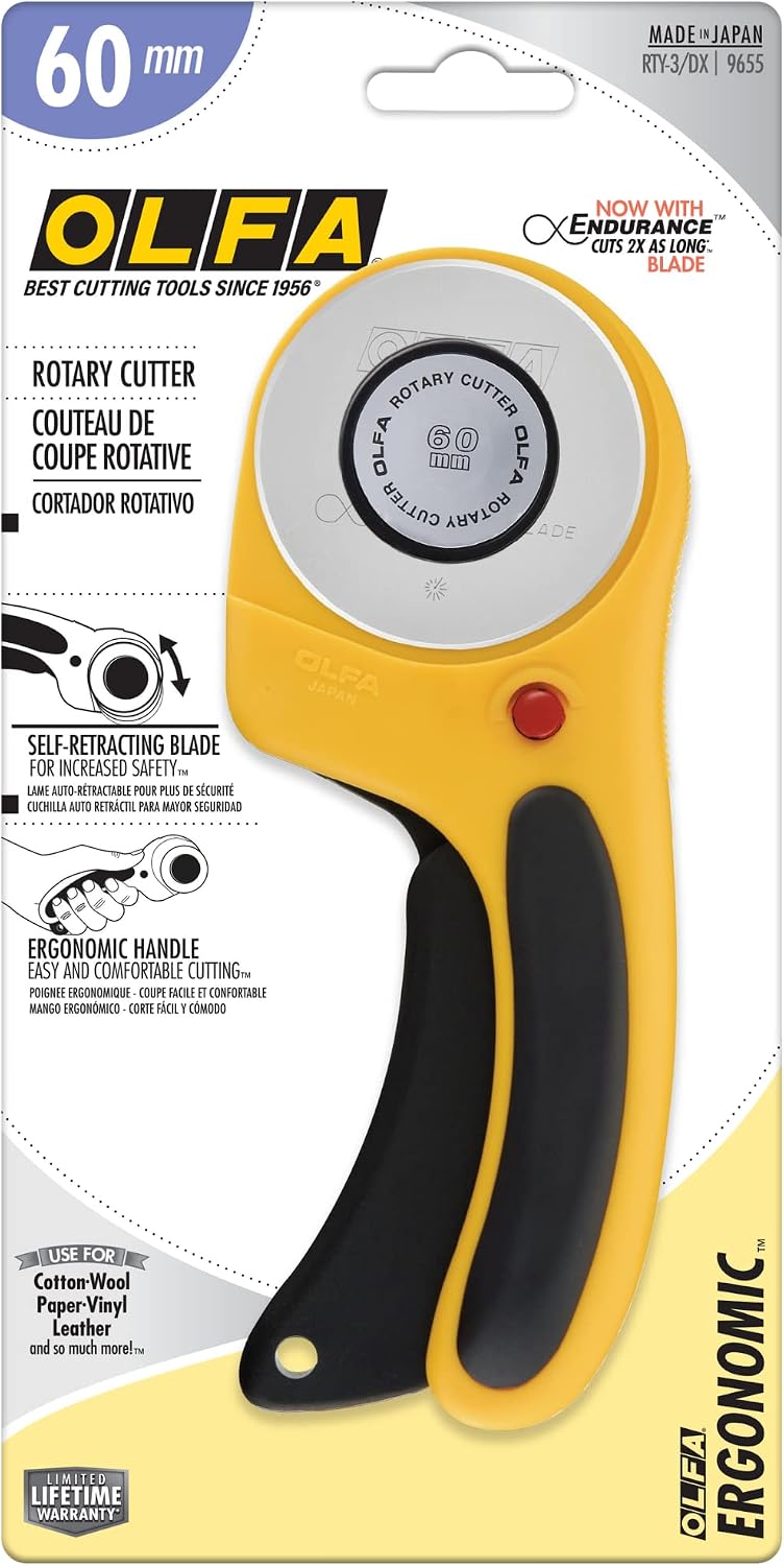 Olfa fabric cutting tool safety lock mechanism