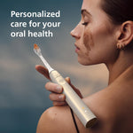 Philips Sonicare 9900 Prestige electric toothbrush handle showing seamless touch interface
