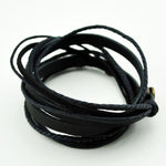 Unisex leather wrap bracelet showing adjustable clasp details