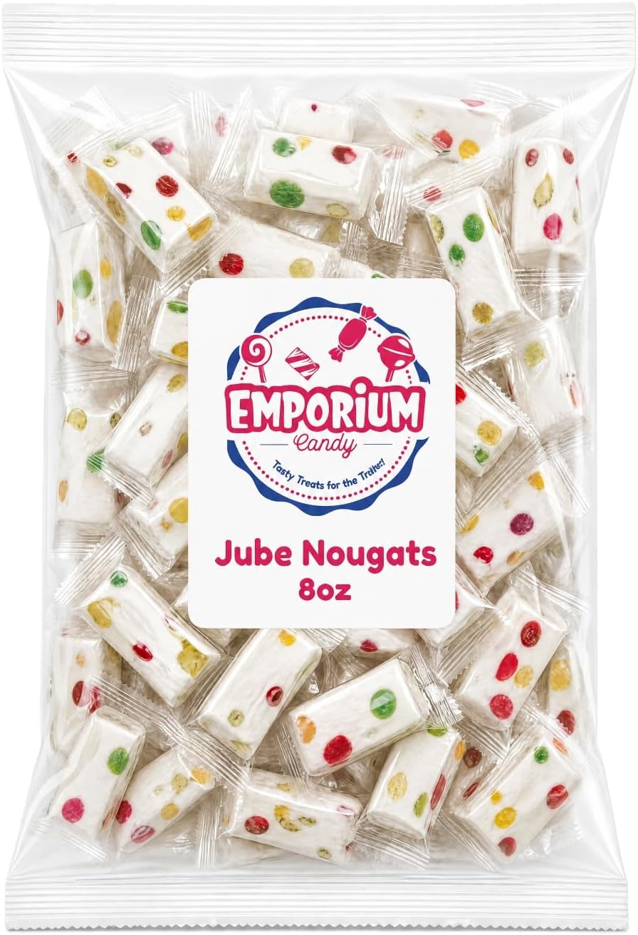 Creamy milk nougat confection close up showing textured fruit jubes