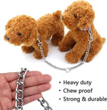Filhome dual dog lead extension being held with one hand during an outdoor walk.