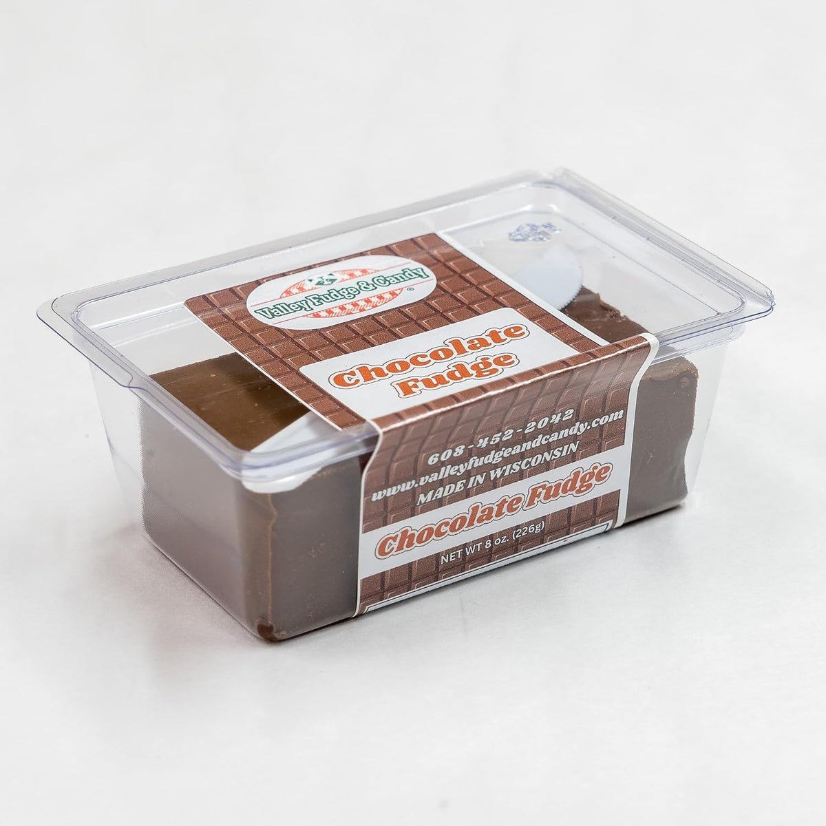 Handmade small batch chocolate fudge container with included serving knife.