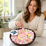 Pastel colored Swedish foam mushroom candies displayed on a platter.