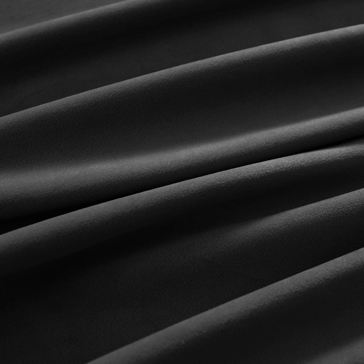 nanbowang velvet curtain panels folded neatly showing quality material
