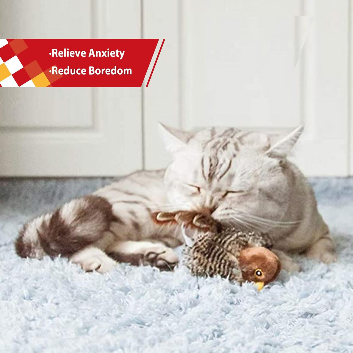 Motion responsive plush bird kitten play toy with catnip.
