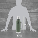 Stanley insulated travel bottle with the outer lid removed and used as a drinking cup.