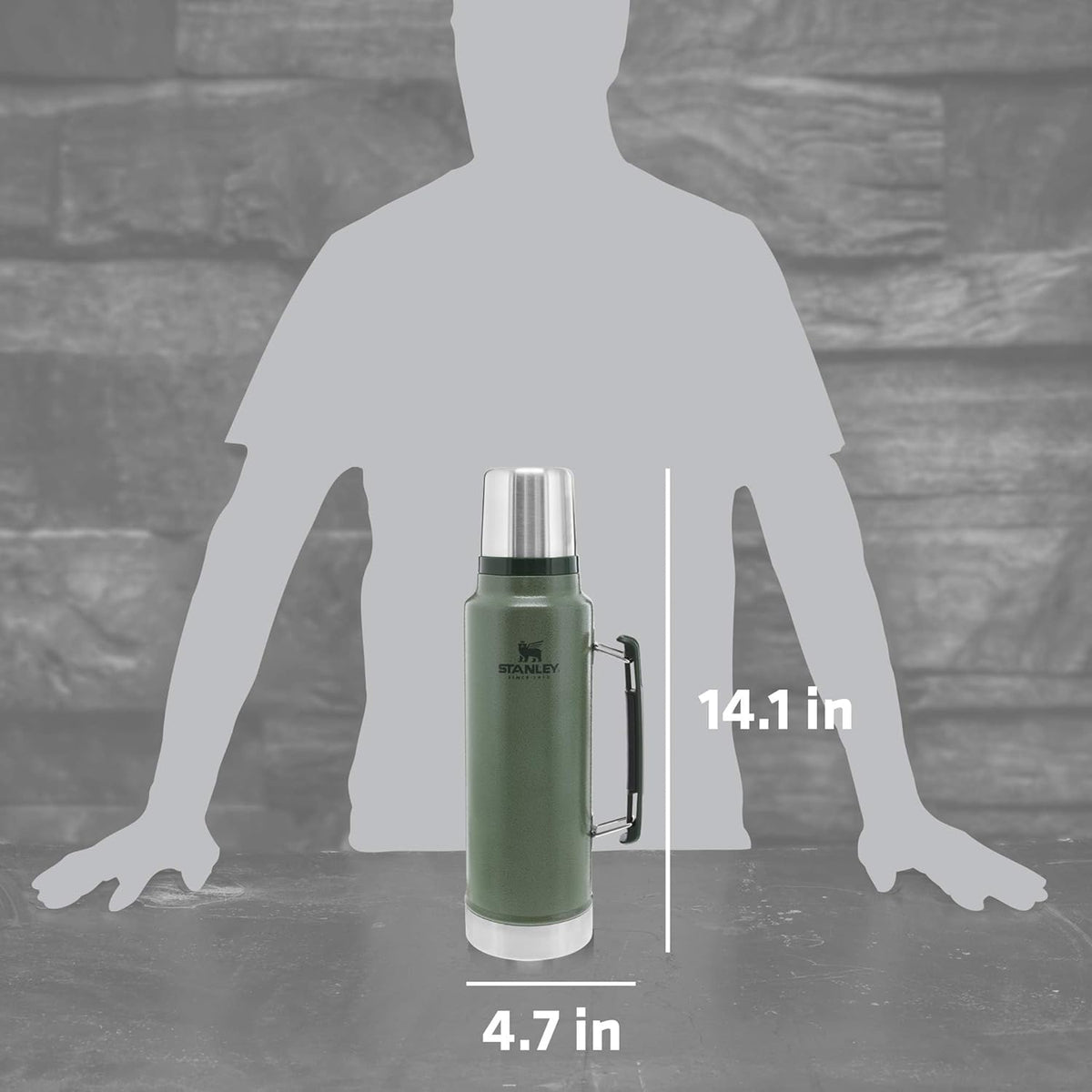 Stanley insulated travel bottle with the outer lid removed and used as a drinking cup.