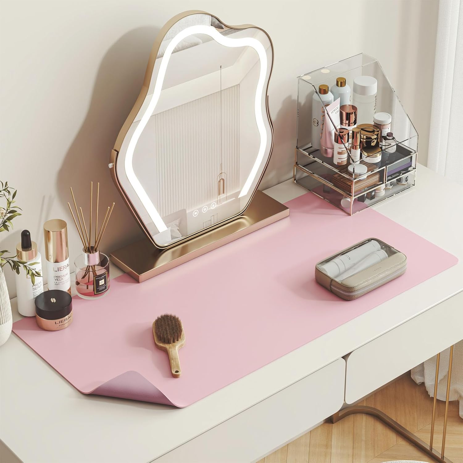 DAWNTREES makeup mat for vanity front view showing the pink leather surface protecting a dressing table.