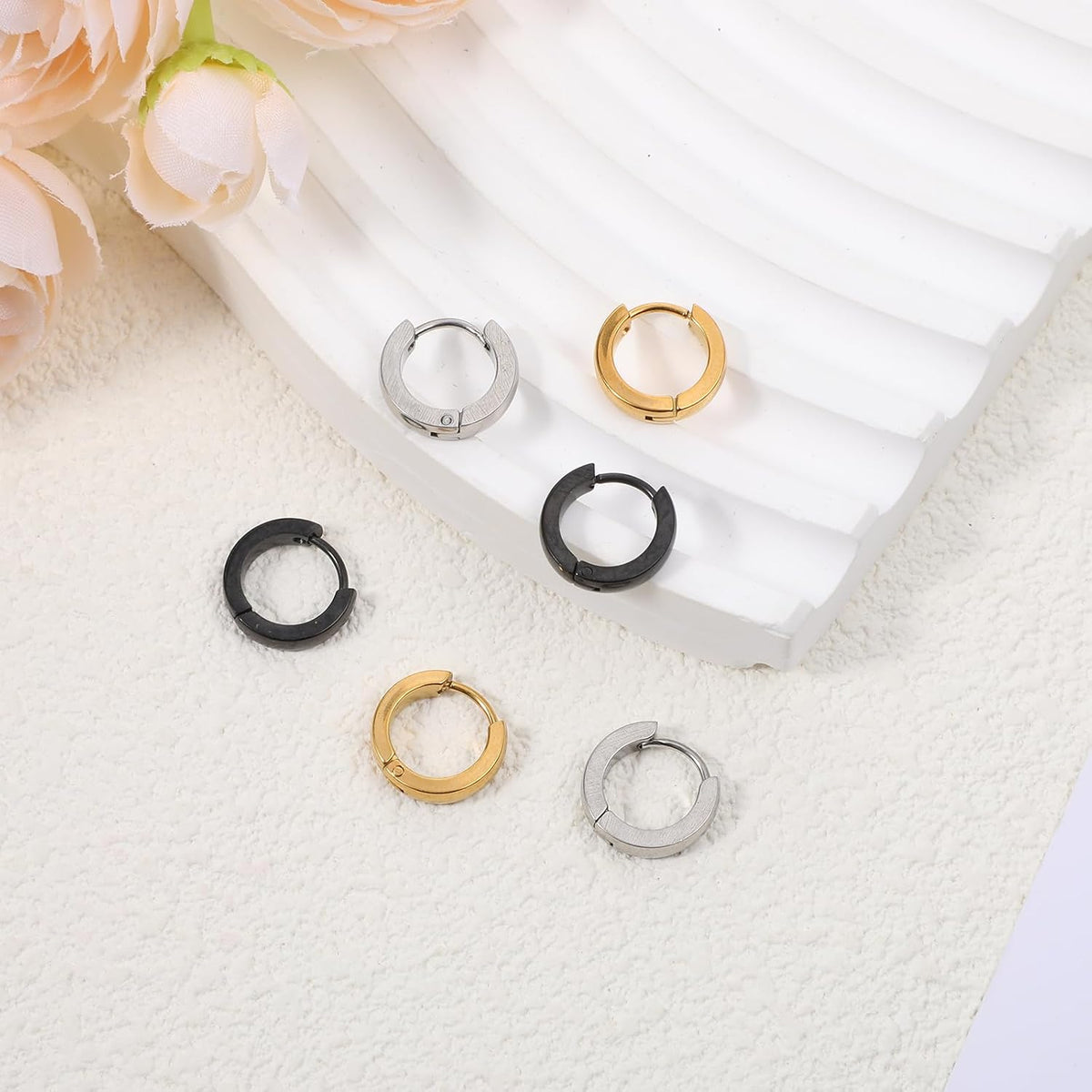 The complete 3-piece jewelry set arranged together for men and women.